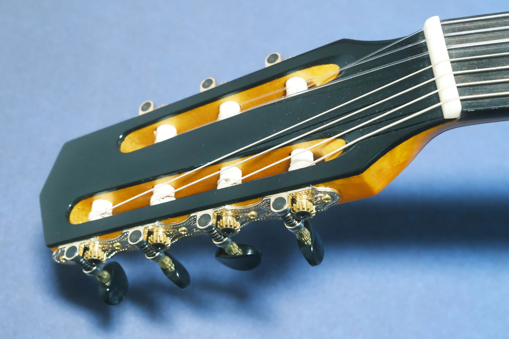 Yunzhi Handcrafted 7-String Gypsy Jazz Guitar | Flamed Maple Hollow Body | H-S-S Pickup | Spruce Top & Ebony Fingerboard
