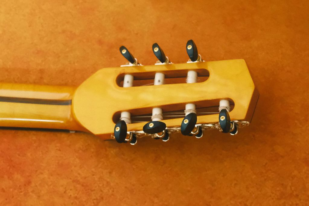Yunzhi Handcrafted 7-String Gypsy Jazz Guitar | Flamed Maple Hollow Body | H-S-S Pickup | Spruce Top & Ebony Fingerboard